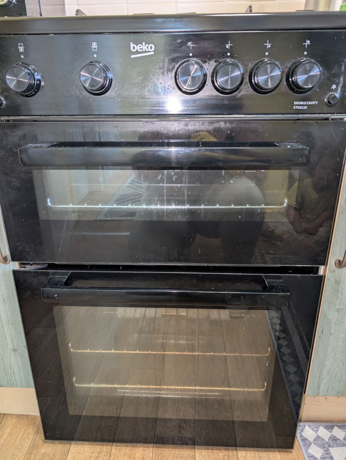 Removed oven door glass cleaned until transparent